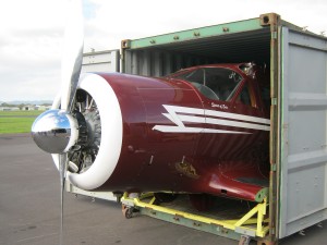 Staggerwing into container for trip to Canada.